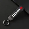 Keychains Carbon Fiber Leather Keychain 360 Degree Rotating Horseshoe Key Rings For Nissan Nismo Tiida Teana Skyline XTrail Qashq8293d