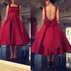 2021 Tanie Długość Herbaty Prom Dresses Spaghetti Backless Burgundia Red Drapowane Krótkie Kobiety Plus Rozmiar Formalna okazja Dress Dress Suknie