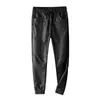 Toppkvalitet Frankrike Style Mens Ripped Moto Byxor Ribbed Skinny Black PU Läder Biker Slim Byxor Penna Storlek S-5XL Mäns