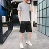 夏の短袖の男子トラックスーツカジュアルスポーツスーツ服の男性Tシャツshortsプリントトラックスーツセットオスのアウトウェア201128