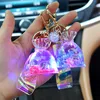 Keychains Lanyards New Acrylic Glow Lucky Bag Liquid Keychain Creative Quicksand Bottle Key Chain Women Bag Pendant Car Keyring Trinket Lovely Gift