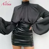 Jupes Aselnn 2021 Printemps PU Cuir Taille haute Ruché Sexy Mini Jupe noire Femmes Tenues Party Streetwear