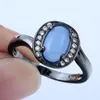 Bröllopsringar graciösa elegant blå eld opal ring smycken mode stil rund sten engagemang svart finger för kvinnor gåva