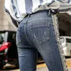 Jeans a zampa ricamati con perle ricamate con frange taglie forti Pantaloni con taglio a stivale Pantaloni casual in denim con fondo a zampa d'elefante elasticizzato 210222