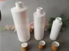 10 pièces 100 ml 200 ml 250 ml 500 ml bouteille de lotion de shampoing pour animaux de compagnie en plastique vide blanc avec capuchon supérieur en disque de bambou de haute qualité