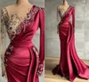 2021 Burgundy Evening Dresses Satin Designer Illusion Long Sleeves Luxury Beaded Crystals Mermaid Ruched Pleats Prom Party Gowns Custom Made