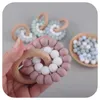 Natural Wooden Ring Teethers for Baby Health Care Accessories Infant Fingers Exercise Toys Colorful Silicone Beaded Soothers Z41397737045