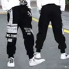 Fashionable Autumn Kids Sport Pants Loose Camouflage Joggers for Big Boys Teenage Elastic Waist Trousers Spring Clothes 211103