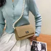 Borse in tessuto di colore nuova borsa a tracolla a catena di perle di moda borsa quadrata a contrasto di colore intrecciato in paglia artistica VF9T