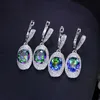 Oszałamiający Srebrny Kolor Owalny Kształt Rainbow Fire Light Blue Crystal Huggie Drop Dangle Kolczyk Dla Kobiet Cz226 210714