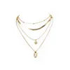 Mode guld faux pärla orm kedja skal hängande halsband för kvinnor halsband ny multi nivå kvinnlig boho vintage smycken gåva g1206