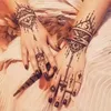 2pcSset Pochoire de tatouage temporaire 25 Designs Art corporel hommes femmes indien Henna Modèle Beauté étanche faux bras réutilisation de la main Tatoo1289000