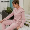 Beavant Elegant Solid Kvinnor Jumpsuits Ruffle Ärm Hooded Krage Höst Vinter Jumpsuit Romper Streetwear Ladies Pocket Overal 210709