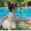 夏の子供の女の子の水着キャンディーカラースリングチュチュ水着子供かわいいスタイルの春服E2539 210610