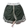 Stor storlek hip-hip-hop modevarumärkesdesigner mens shorts med blixtlås drastring mesh casual cool killen korta byxor 073102320m