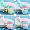 Плавучая кошка Macaron Quicksand Keychain Surfing Coat Draving Bottle Bottle Botter Автомобильная сумка для ключа Сумка для цепного кольца для девушки и женщин Подарочные украшения Аксессуары