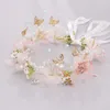 Romantiska Kvinnor Headband Sweet Butterfly Flower Fairy Wreath Hairband Party Headpiece Bridal Bröllop Smycken Tillbehör XH J0121