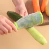 Tipo di stoccaggio multifunzionale Zester Utensili per frutta e verdura Coltello per sbucciare con tubo di stoccaggio per cetriolo, carota, mela Famiglia