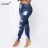 Pantalones vaqueros rasgados de color azul claro para mujer Estilo callejero Pantalones de lápiz de mezclilla con agujeros ajustados y tiro medio sexy 210715