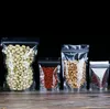 100 pz / lotto Stand Up Bag Sacchetti con cerniera in plastica trasparente Imballaggio a prova di odore Sacchetti riutilizzabili per alimenti per caffè, tè, snack