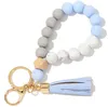 Pulseira de corda de corda de borla de madeira chaveiros chaveiro grau de alimento grânulos de silicone braceletes mulheres menina chaveiro pulso pulseira 9 cores