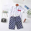 Vestiti per bebè Estate Ragazzi Cartoon Risvolto T-shirt + Pantaloncini Cintura 3 pezzi Suit Kids 210528