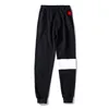 Pantaloncini da uomo Pantaloni sportivi da uomo Spiaggia per l'autunno Primavera Stile Pantaloni lunghi unisex Pantaloni sportivi con lettere in rilievo Coulisse Regolabili Capispalla Capris Street Sweaterpants