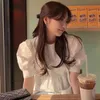 コレヒパアの女性のシャツ夏の韓国のシックな女性シンプルなラウンドネックバック中空ネクタイ広松裾のパフスリーブ人形ブラウス210526