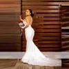 Aso Ebi Abiti da sposa a sirena con collo trasparente Illusion maniche lunghe Abito da sposa Appliques di pizzo Perle vestido de noiva Abiti da sposa africani senza schienale sexy M442