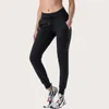 Tecido nu-sentir treino esporte joggers calças cortadas das mulheres cintura cordão fitness correndo suor pant com dois lados pocket192h