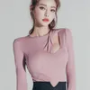 WOMENGAGA Corée Printemps Eté Top Évider Irrégulier Confortable Col Rond Sexy Transparent Manches Longues Base T-shirts IOP3 210603