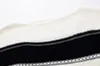 Europäisch-amerikanische neue Damen-Strick-T-Shirts, schwarz, Slash-Ausschnitt, gestreift, passender Langarm-Strickpullover, lockere Herbst-Winter-Kleidung