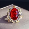 Trouwringen Klassieke overdrijving Ring Inleg overtreffen Big Red Oval Cubic Zirconia tweekleurig geometrie sieraden voor vrouwen Bithday Gifts Edwi22