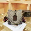 Designer This year's is new fashion the autumn of One shoulder diagonal span denim contrast color bucket bag high-capacity handbag Handbags Outlet