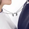Ketten 28TF 2 Stück niedliche Astronauten Magnet Anziehungsanhänger Paar Halskette Freundschaftsschmuck Kreative coole Kettenhalsketten für Frauen