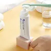 Set di accessori per il bagno Spremiagrumi per dentifricio in plastica per la casa Dispenser facile Portarotolo Fornitura per il bagno Accessori per la pulizia dei denti Creme Dent