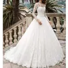 Elie Saab 2021 Bridal Gowns Bateau Neck Lace Appliqued Beaded Long Sleeves Hollow Buttons Back Puffy Ruffle Chapel Train Wedding Dresses