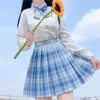 Jupes à carreaux pour femmes Uniforme scolaire Plissé JK Jupe Fille Japonaise Été Harajuku Preppy Taille haute A-Line 210629