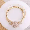 Fashion Jewelry Healthy Cubic Zirconia Gold Hand Chain Bracelet
