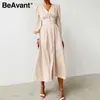 BeAvant Elegant spring satin bishop sleeve a-line dress women V-neck high waist button dress solid Vintage long dresses chic 210709
