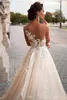섹시한 레이스 A 라인 웨딩 드레스 2021 깎아 지른 백라이트 샴페인 환상 국가 비치 웨딩 드레스 신부 가운 사용자 정의 만든 Vestidos