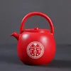 red tea pots