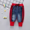 Marca Kids Cartoon Pantaloni Pantalone Fashion Girls Jeans Bambini Ragazzi Hole Jeans Kids Fashion Denim Pants Baby Jean Abbigliamento infantile 211028