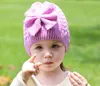 Nuovo cappello a maglia con fiocco a colori a colore puro di lana, caldo cappello per bambini a cupola invernale gc481