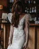 2021 Shiny Long Sleeve Wedding Dresses Mermaid Bridal Gowns Sexy Backless Appliques Lace Floral Beads Boho Beach Bride Dress