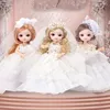 Dolls New 19CM Bjd Doll 13 Movable Joints Brown 3D Big Eyes Fashion School Uniform and Wedding Dress Best Birthday Gift for Kids 220315