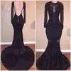 2022 Elegant Black Illusion Prom Dresses Sexy Backless Mermaid Long Sleeves Stretch Evening Party Gowns with Appliques Beaded