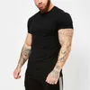 T-shirt manica corta moda estiva tinta unita uomo abbigliamento fitness cotone O-collo Silm Fit T-shirt uomo casual taglie forti M-2XL 210726