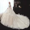 Shiny Beading Appliques Lace Luxury Ball Gown Wedding Dress Alibaba Vestidos Cap Sleeve Chapel Train Princess Bridal Gowns