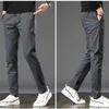 Tendencia de la moda pantalones casuales para hombres Pantalones de pies pequeños Otoño e invierno Elástico todo-fósforo Cintura elástica Pantalones largos de color sólido 210531